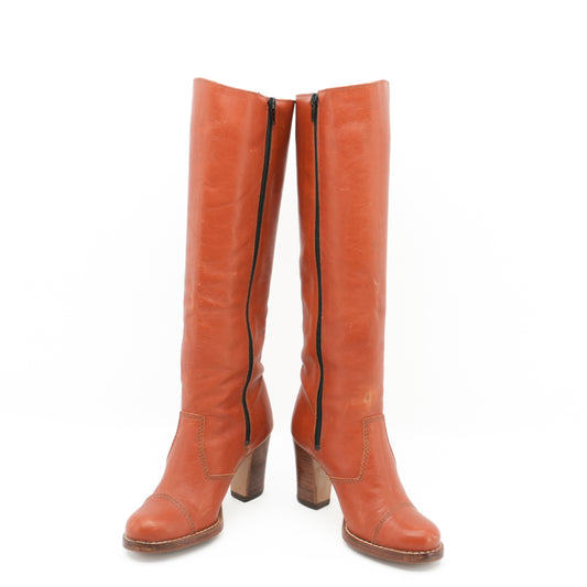 orangeleatherkneehighbootswithzipper.jpg