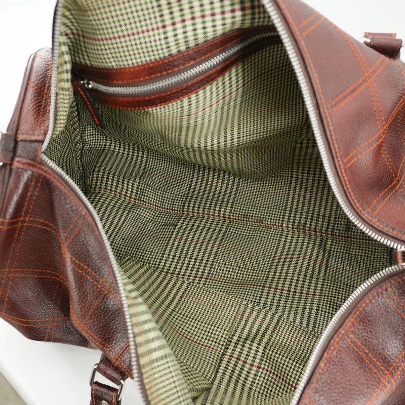 brown-leather-duffel-bag-with-orange-strap-6.jpg