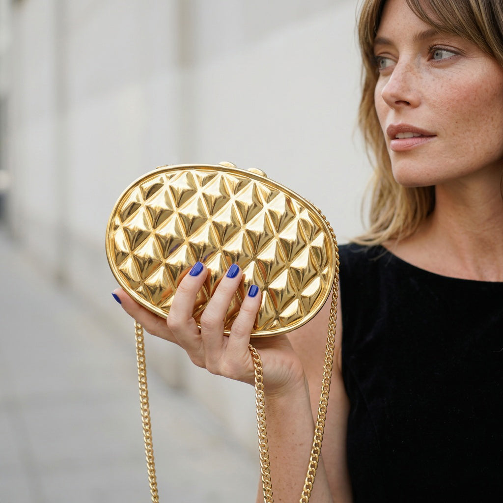 hard-case-metal-clutch-chain-minaudiere-purse-vintage-quilted-oval-gold-crossbody-80s-evening-bag.jpg