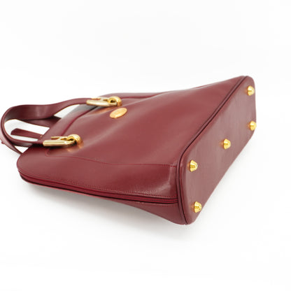 burgundyleatherhandbagwithgoldhardware-8.jpg