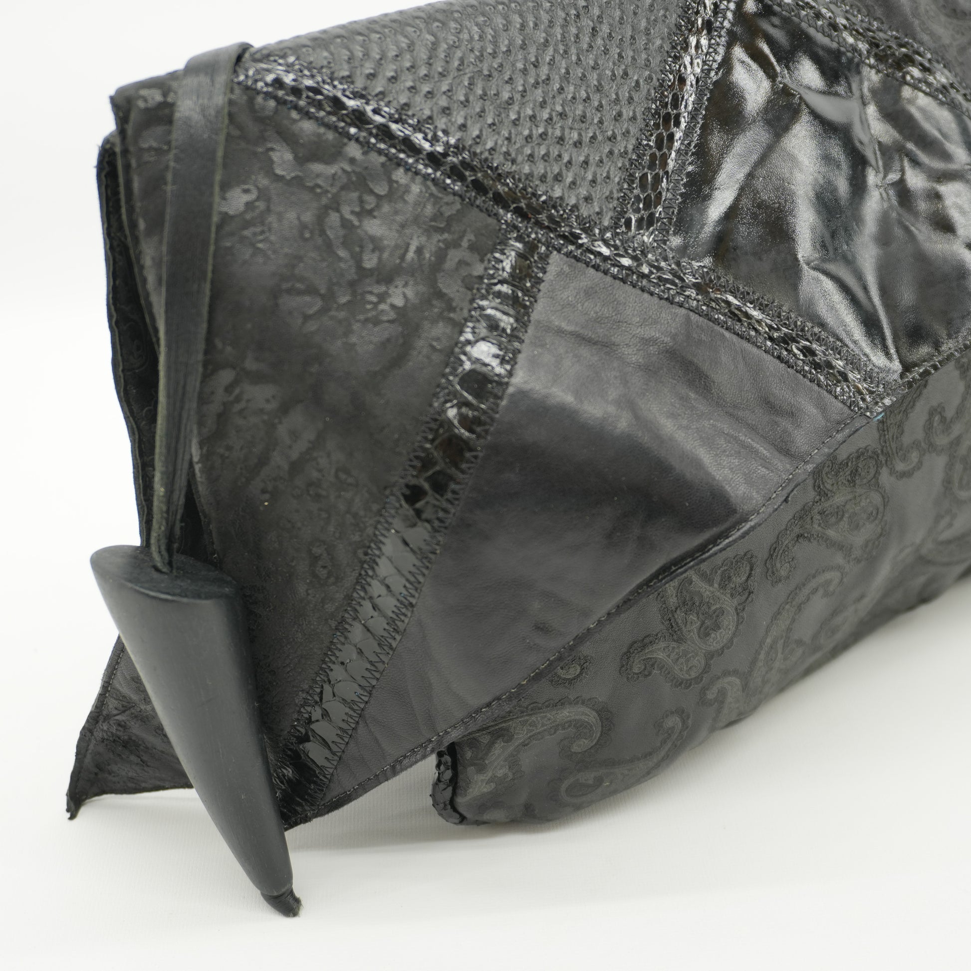 vintage-80s-glam-avant-garde-black-leather-paisley-patent-clutch.jpg