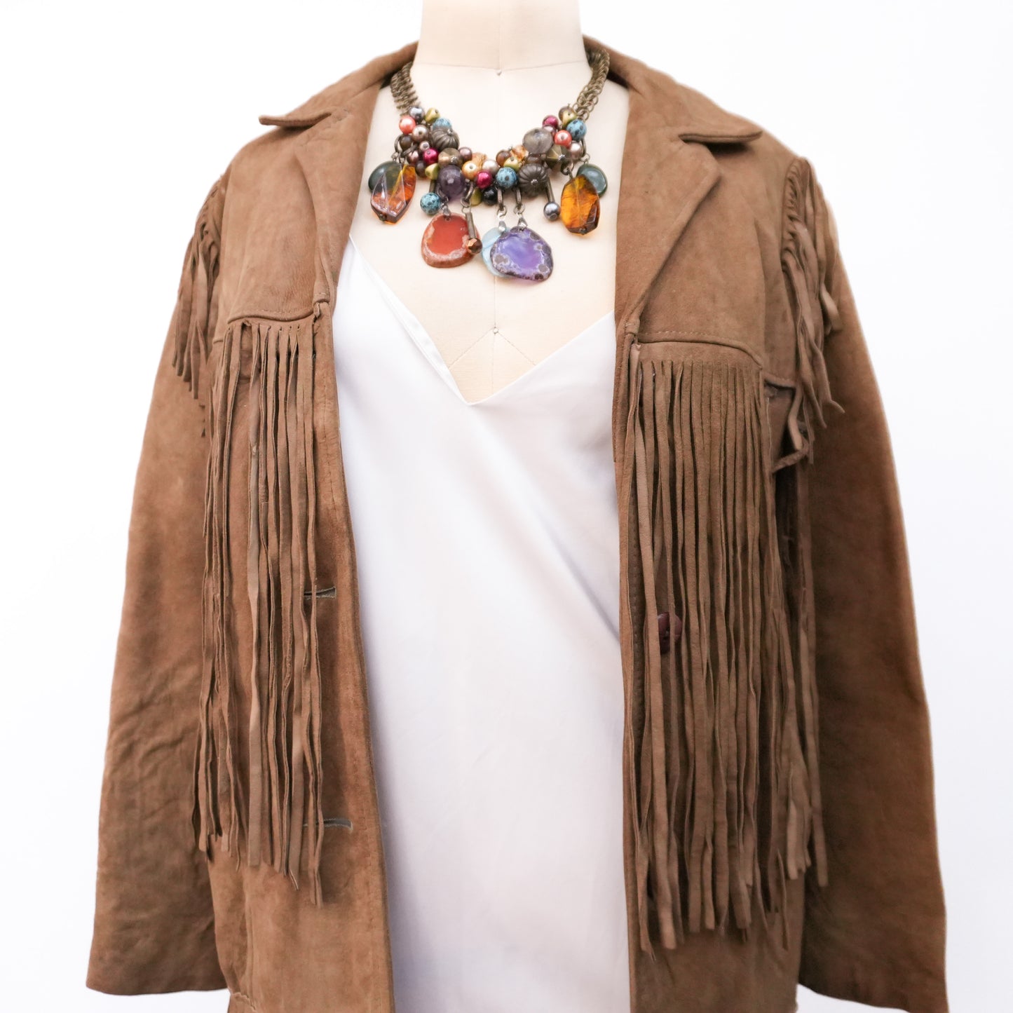 brown-suede-fringe-jacket-with-green-crossbody-bag-6.jpg