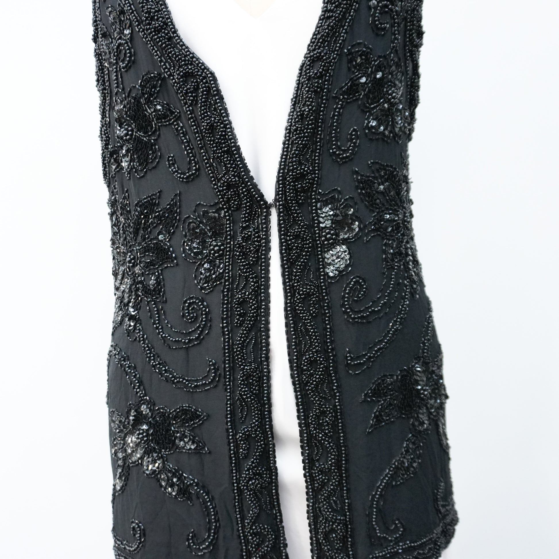 blacksequinedvestwithwhitetopandblackpants-10.jpg