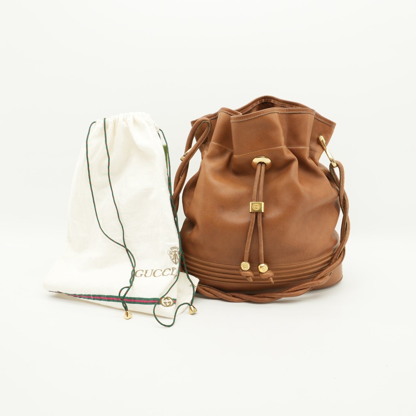 vintageguccihoneybrownbucketbag.jpg