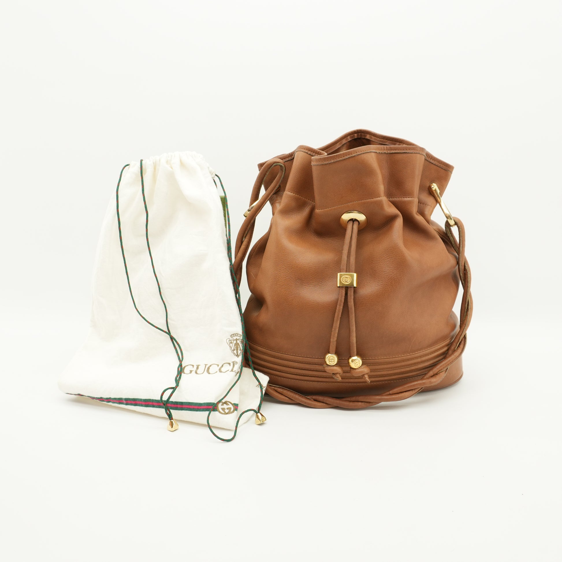 vintageguccihoneybrownbucketbag.jpg
