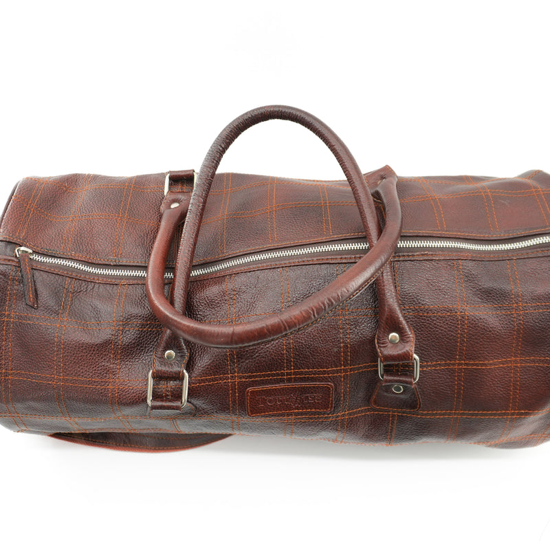 brown-leather-duffel-bag-with-orange-strap-7.jpg