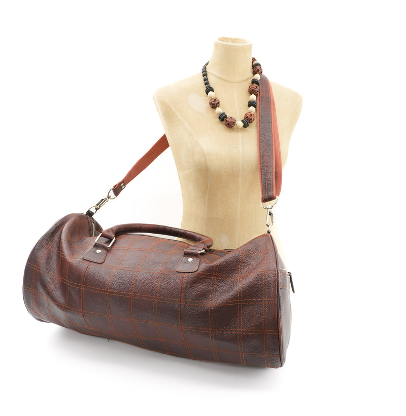 brown-leather-duffel-bag-with-orange-strap-3.jpg