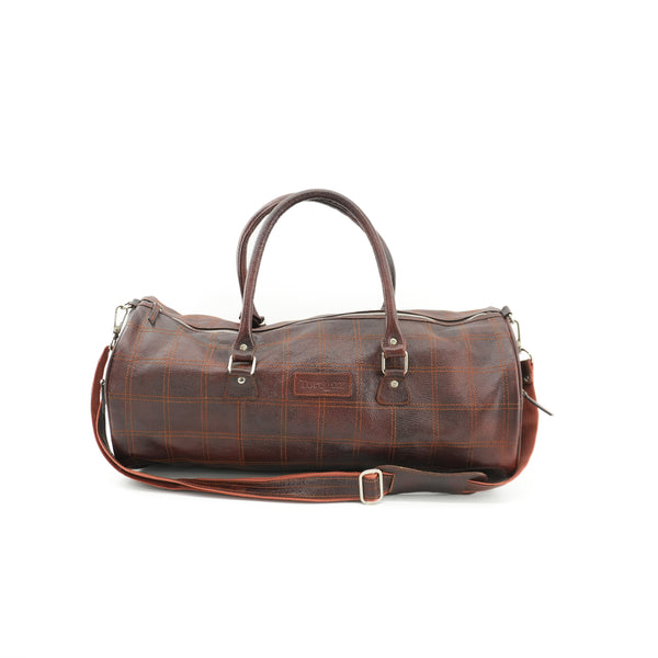 brown-leather-duffel-bag-with-orange-strap.jpg