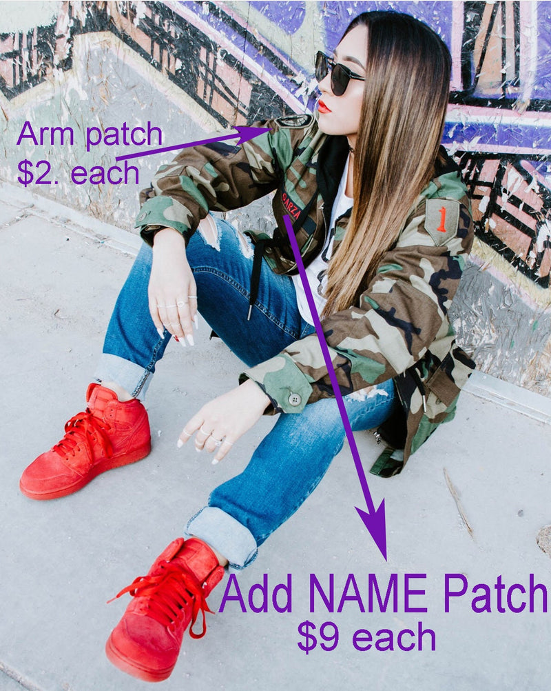 Coat with patch on arm sales